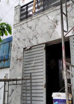 Mặt tiền nhà ốp đá nung kết màu trắng