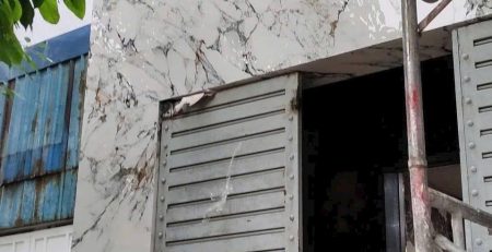 Mặt tiền nhà ốp đá nung kết màu trắng