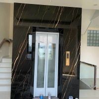 Thang máy ốp đá nung kết nhập khẩu màu đen